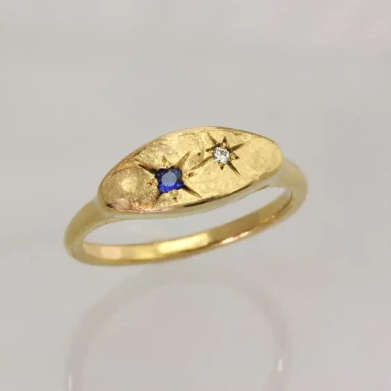 Gold-plated ring with blue star