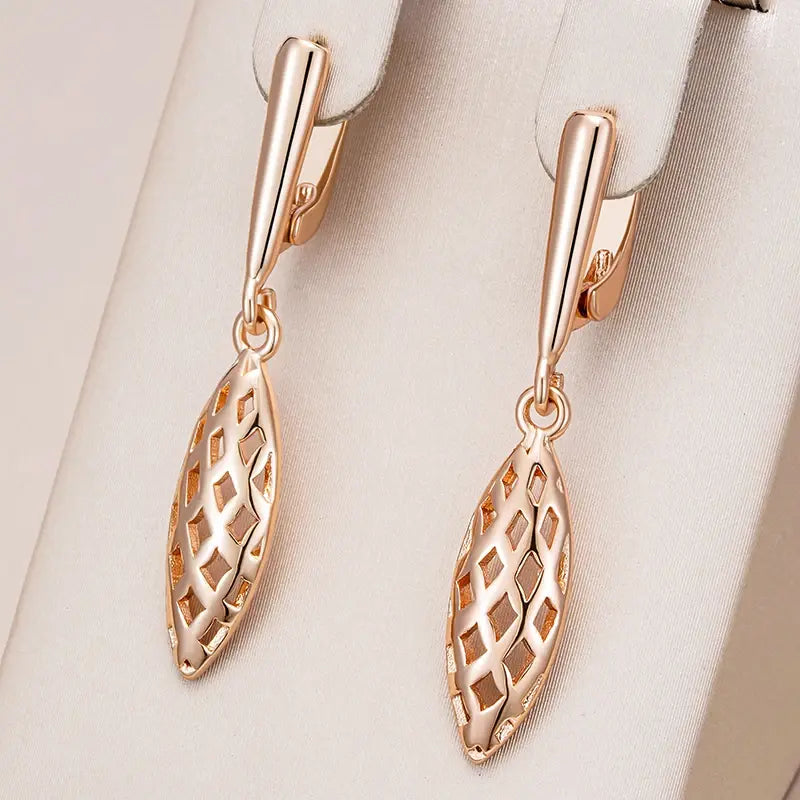 Hollow, elegant gold-plated pendant earrings