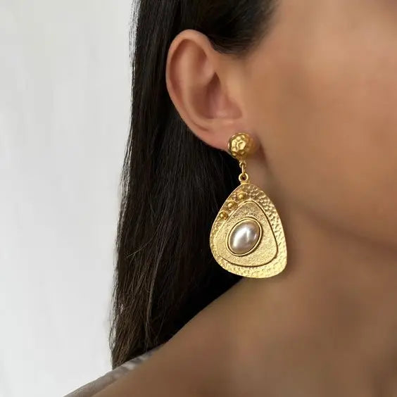 Gold earrings with pearls in vintage style