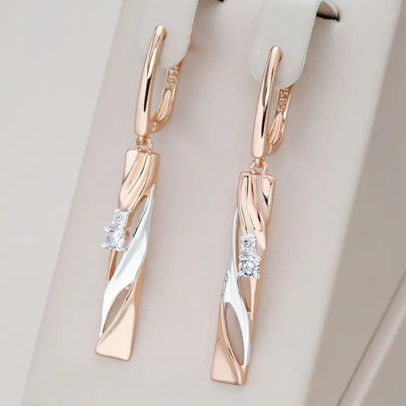 Elegant rectangular earrings with gold-colored crystals