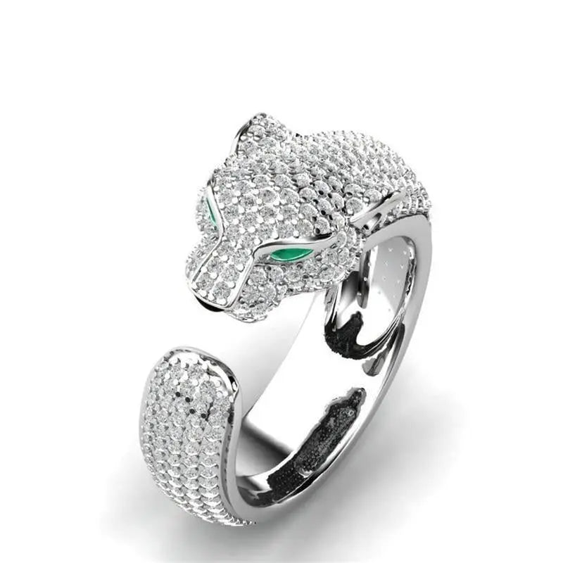 Adjustable jaguar ring in 18K silver and 18K rose gold with green zirconia eyes