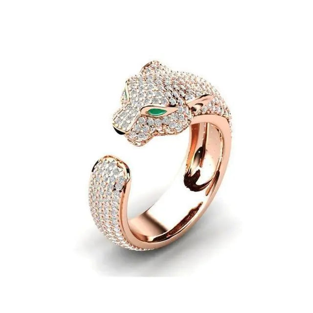 Adjustable jaguar ring in 18K silver and 18K rose gold with green zirconia eyes