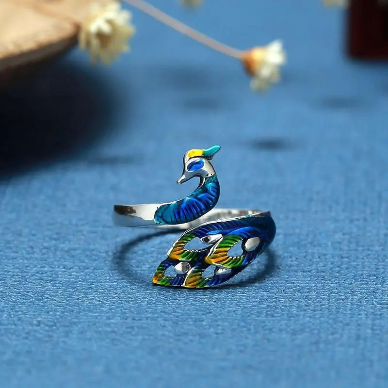 Hand-painted adjustable peacock ring in sterling silver