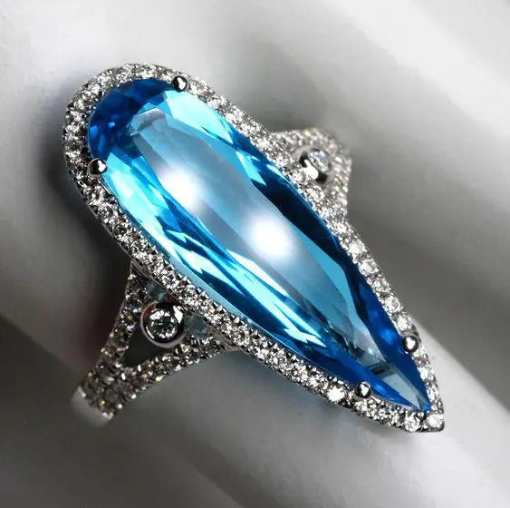 Oval ring with blue crystal