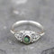 Filigree ring with rainbow shell