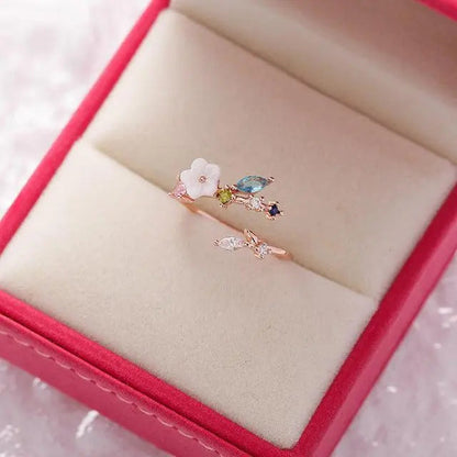 Adjustable "Wildflower" ring with gold gemstones