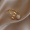 Triple ball ring made of gold and zirconium dioxide
