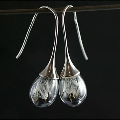 Silver earrings with dandelion pendant