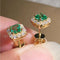 Earrings with green crystal and gold