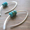 Wave-shaped boho earrings with turquoise stones in sterling silver