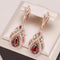 Gold earrings with red mandala and zircons