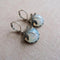Dragonfly earrings with white crystal in sterling silver