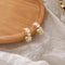 Luxury gold earrings in the shape of daisies