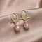 Gold hoop earrings with pearls