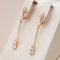Gold earrings with zirconium dioxide
