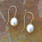 Gold earrings with pearls in vintage style