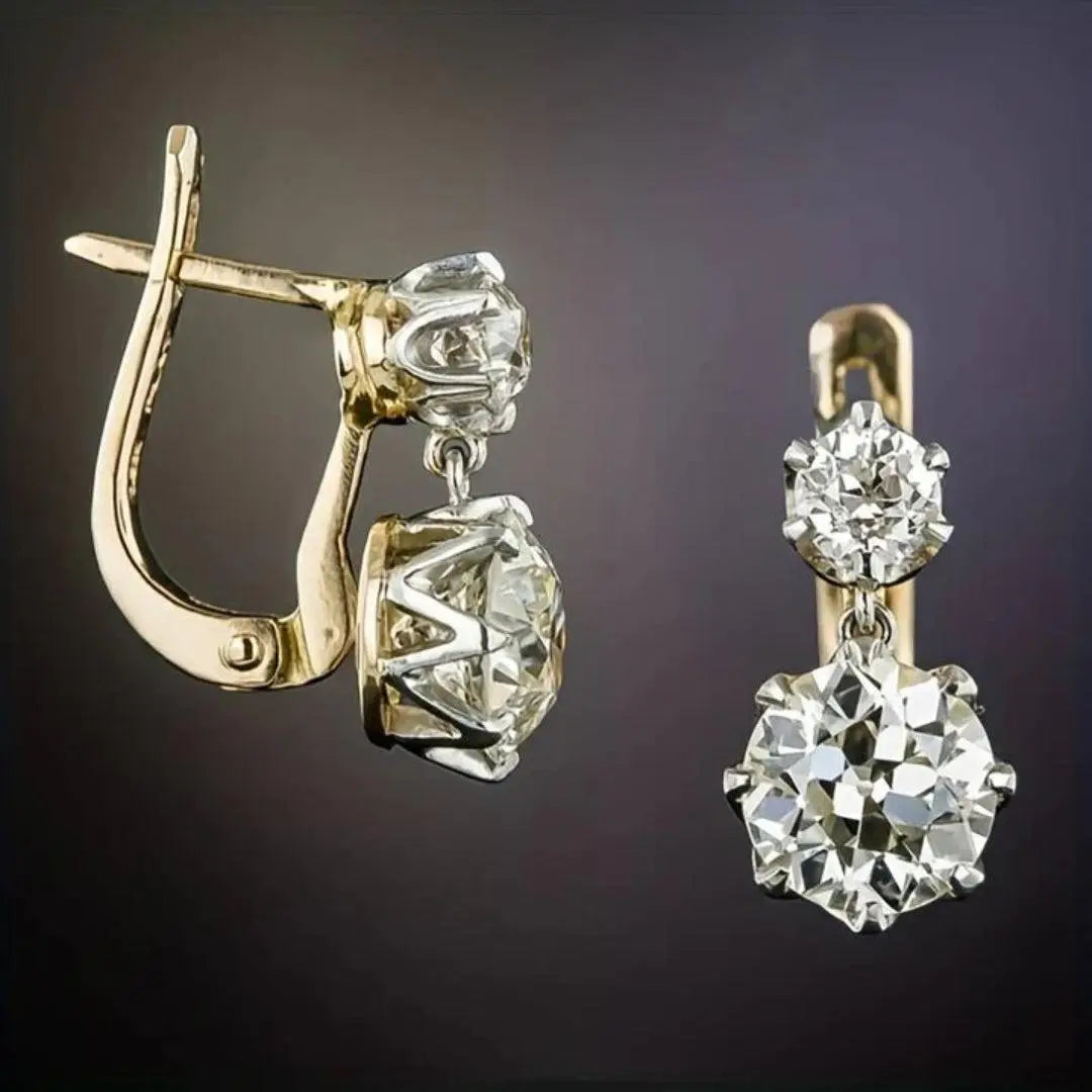Gold earrings with zircons in vintage style