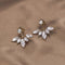 Gold earrings with zircons