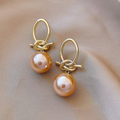 Gold hoop earrings with pearls