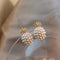 Tropical pineapple earrings with pearl embellishment