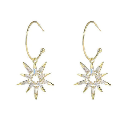 Gold and silver star earrings