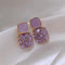 Luxury purple earrings with zircons