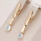 Zirconia earrings in elegant gold