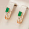 Elegant gold earrings with green crystal and cubic zirconia