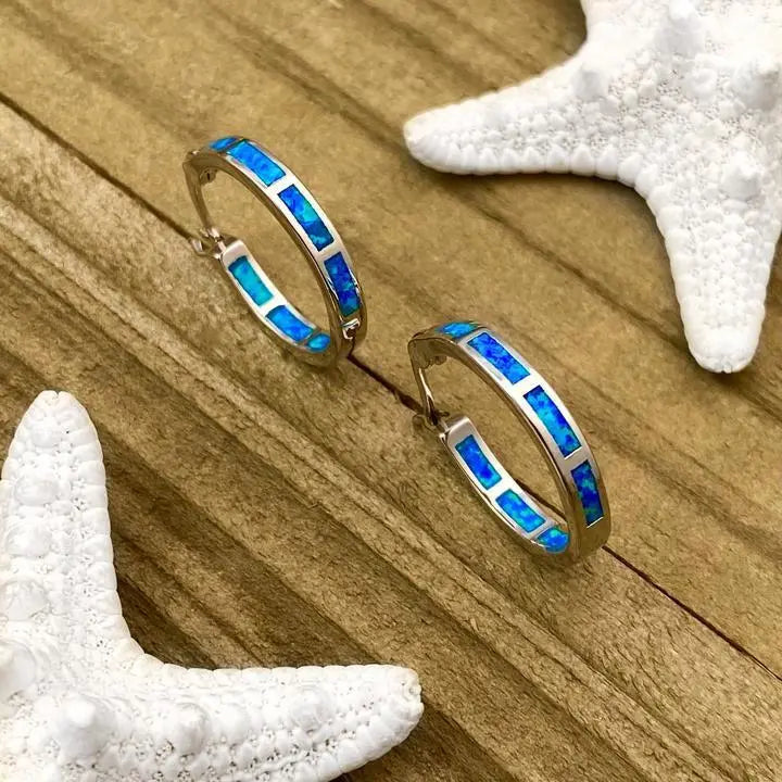 Luxury silver and opal rings inspired by the ocean