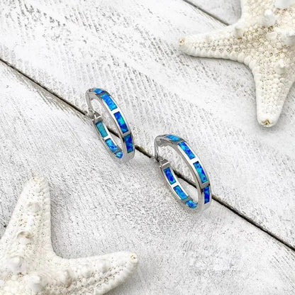 Luxury silver and opal rings inspired by the ocean