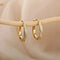 Irregular minimalist shiny gold earrings