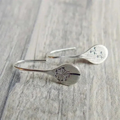 Earrings in the shape of dandelion leaves in sterling silver