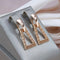 Geometric gold zirconia pendant earrings