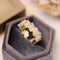 Elegant ring with inlaid zircons