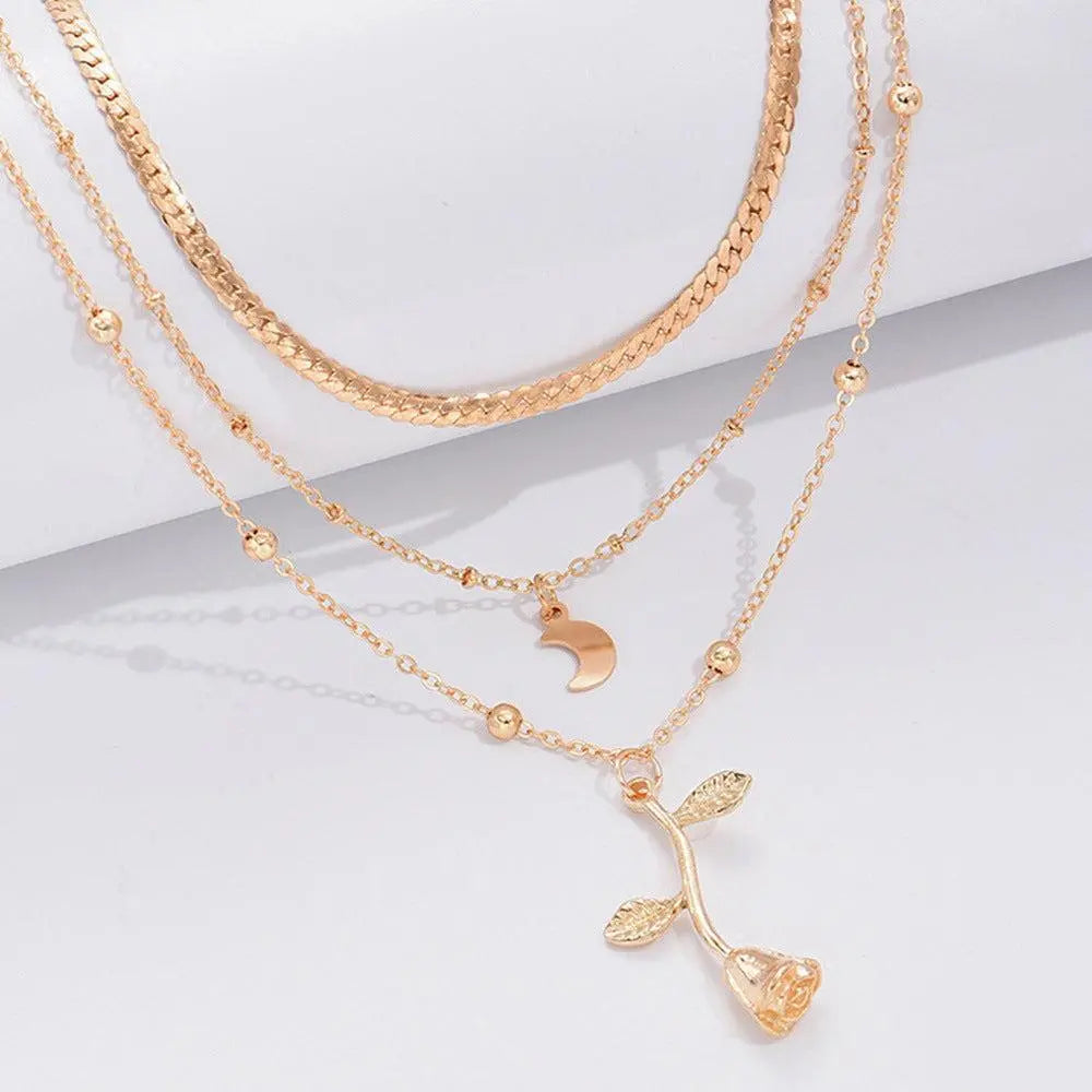 Gold necklace with rose