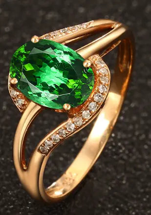 Gold ring with garnet and zircons in vintage style