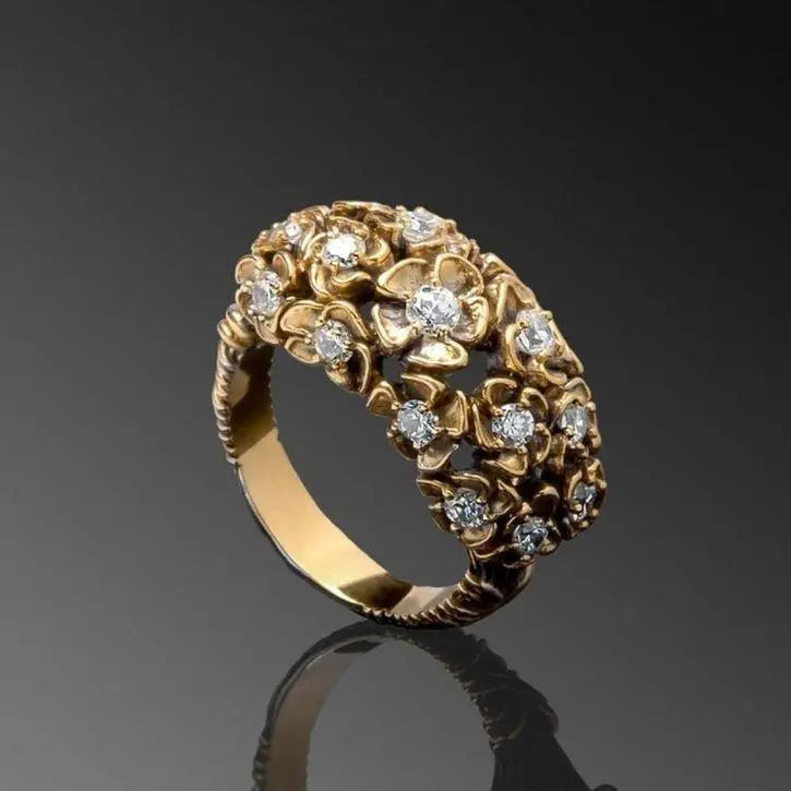 Shiny gold ring with flowers