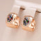 Small gold earrings with multicolored crystals