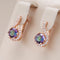 Small earrings with multicolored crystals in gold color