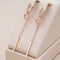 Pendant earrings with zircons