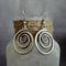 Round silver earrings in vintage style