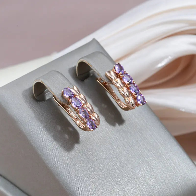 Elegant sparkling gold and purple zirconia earrings