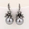 Silver earrings with pearls in vintage style