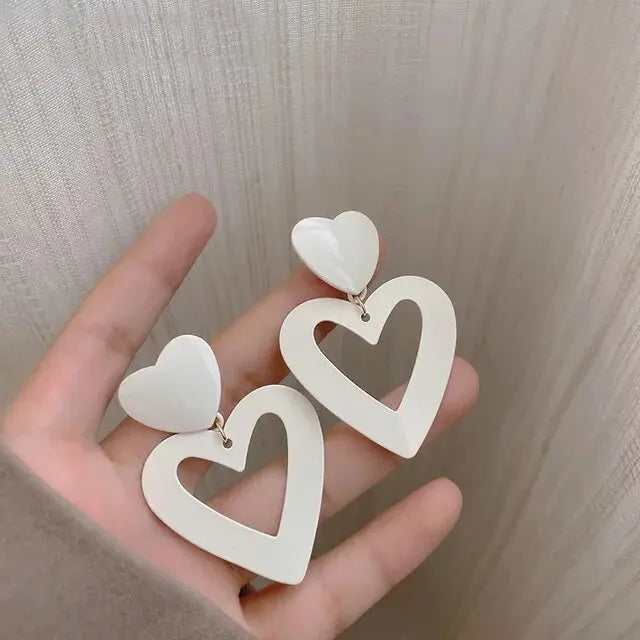 Elegant earrings with white hearts