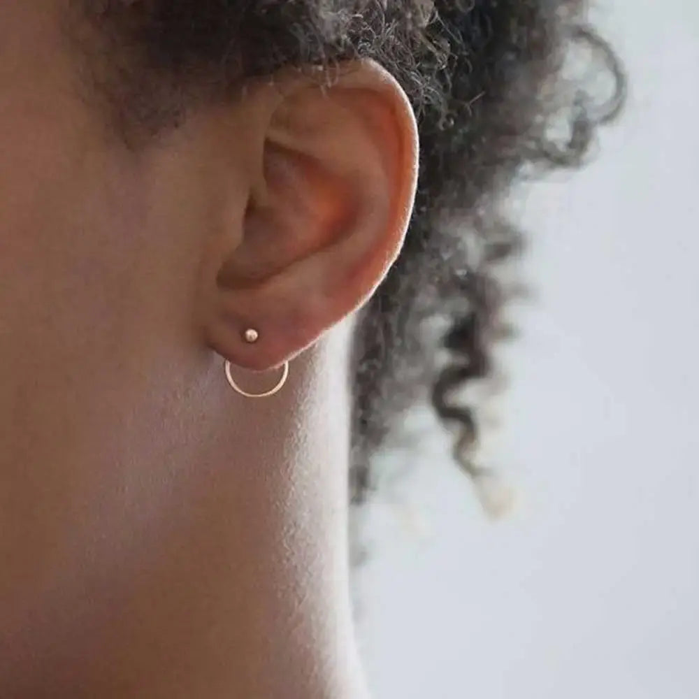 Gold earrings in vintage style