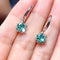 Elegant earrings with turquoise and zircons
