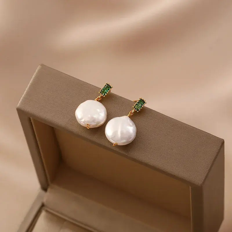 Elegant earrings with green crystals