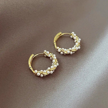 Elegant round earrings with pearls and inlay