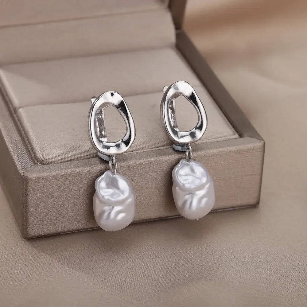 Silver earrings with pearls in vintage style