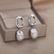 Silver earrings with pearls in vintage style
